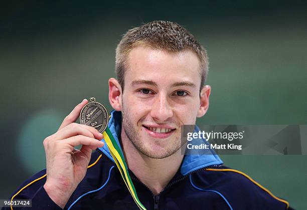 Matthew Mitcham of NSW poses after winning the Men's Platform Final during the 2010 Australian Open Diving Championships at the Sydney Olympic Park...