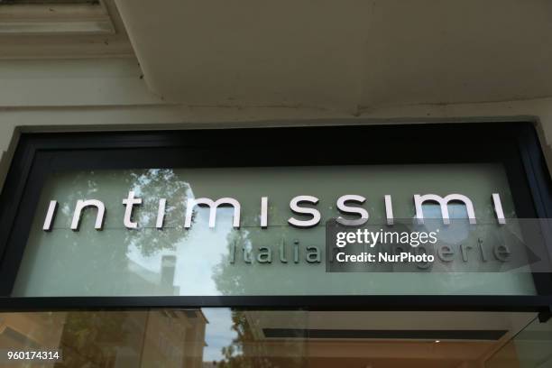 The logo of Italian clothing label founded in 1996 Intimissimi, which specializes in bras, briefs, lingerie, vests, and pyjamas for women and men is...