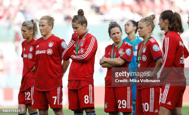 Team Bayern Muenchen with Melanie Behringer of Muenchen , Melanie Leupolz of Muenchen and Nicole Rolser of Muenchen disappointed after the Women's...