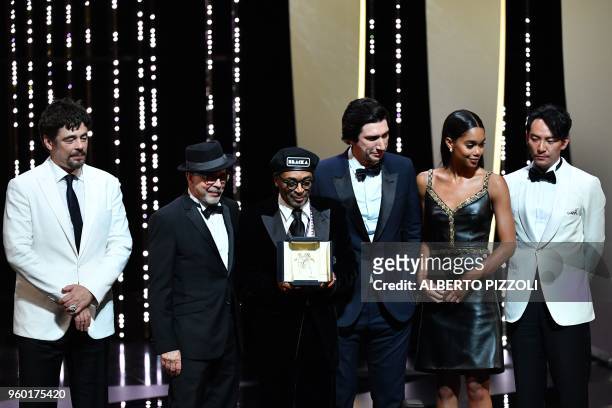 Director Spike Lee poses on stage on May 19, 2018 with US-Puerto Rican actor and President of the Un Certain Regard jury Benicio Del Toro , a guest,...