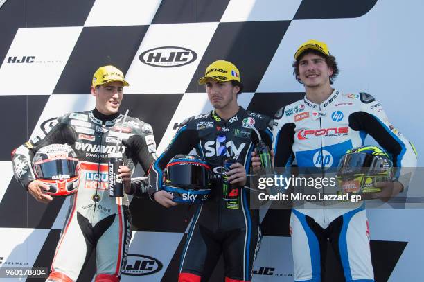 Xavi Vierge of Spain and Dynavolt Intact GP, Francesco Bagnaia of Italy and Sky Racing Team VR46 and Lorenzo Balbassarri of Italy and Pons HP40...