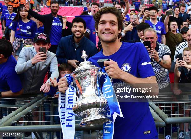 Marcos Alonso of Chelsea poses with the Emirates FA Cup trophy following his side's win during The Emirates FA Cup Final between Chelsea and...