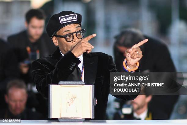 Director Spike Lee poses with his trophy on May 19, 2018 during a photocall after he won the Grand Prix for the film "BlacKkKlansman" at the 71st...