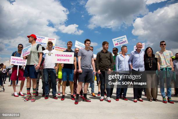 Men wearing high-heeled shoes gathered in order to show solidarity with women and the struggles they face during the "Walk a Mile in Her Shoes"...