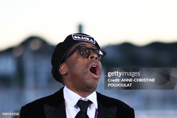 Director Spike Lee reacts as he poses on May 19, 2018 during a photocall after he won the Grand Prix for the film "BlacKkKlansman" at the 71st...