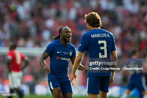 Chelsea's Victor Moses celebrates with team mate Marcos Alonso at the final whistle during the Emirates FA Cup Final match between Chelsea and...