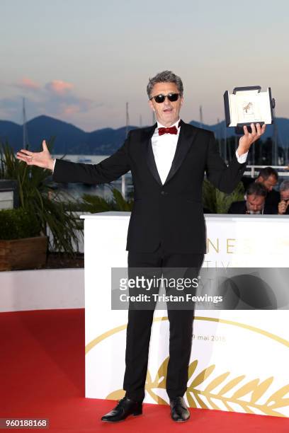 Director Pawel Pawlikowski poses with the Best Director award for 'Cold War' at the photocall the Palme D'Or Winner during the the 71st annual Cannes...