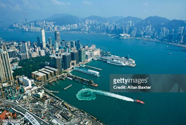 aerial view of ferry port and hong kong island - hk landscape stock-fotos und bilder