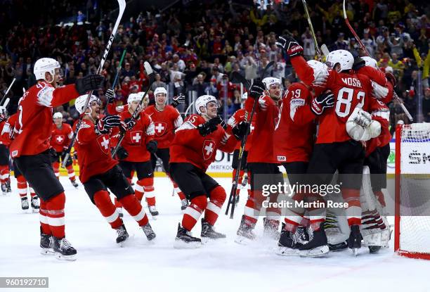 The team of Switzerland celebrate victory after the 2018 IIHF Ice Hockey World Championship Semi Final game between Canada and Switzerland at Royal...