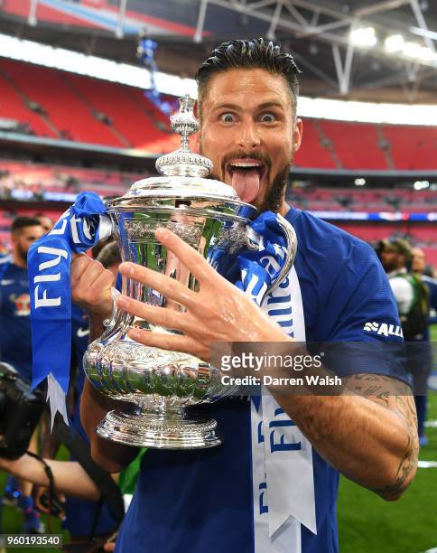 Olivier Giroud of Chelsea poses with the Emirates FA Cup trophy; his 4th FA Cup Final win in 5 years, following his sides victory in The Emirates FA...