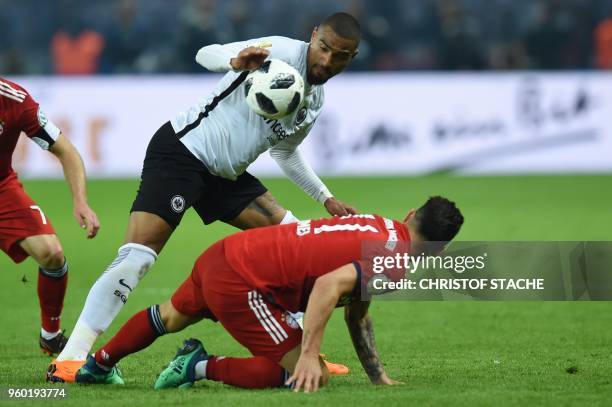 Frankfurt's Ghanaian midfielder Kevin-Prince Boateng appear to touch the ball with his hand during the German Cup DFB Pokal final football match FC...