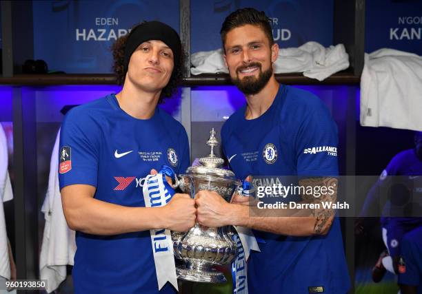 David Luiz of Chelsea and Olivier Giroud of Chelsea pose with the Emirates FA Cup trophy following their sides victory in The Emirates FA Cup Final...