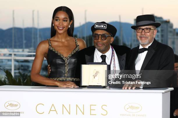 Barry Alexander Brown and Laura Harrier pose with director Spike Lee holding the Grand Prix award for 'BlacKkKlansman' and Laura Harrier next to him...