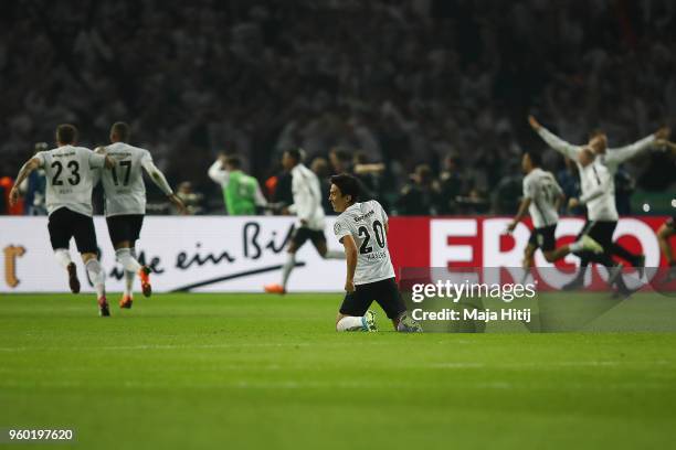 Makoto Hasebe of Frankfurt celebrates after Mijat Gacinovic of Frankfurt scored a goal to make it 1:3 during the DFB Cup final between Bayern...