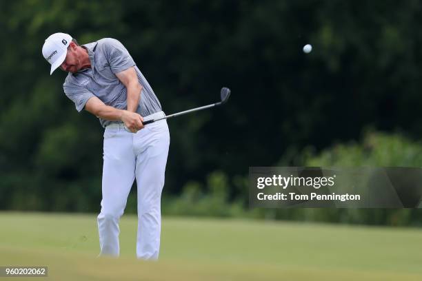 Jimmy Walker plays his second shot from the ninth fairway during the third round of the AT&T Byron Nelson at Trinity Forest Golf Club on May 19, 2018...