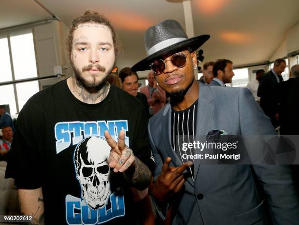 Musical artists Post Malone and Ne-Yo attend The Stronach Group Chalet at 143rd Preakness Stakes on May 19, 2018 in Baltimore, Maryland.