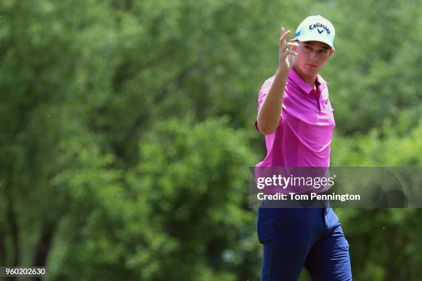 Aaron Wise reacts following a putt attempt on the ninth green during the third round of the AT&T Byron Nelson at Trinity Forest Golf Club on May 19,...