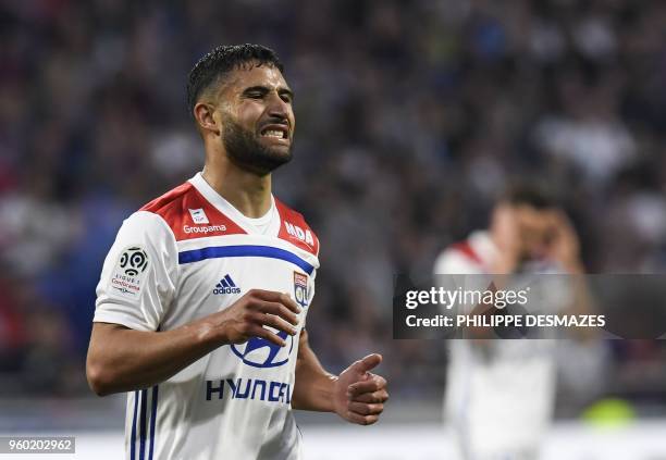 Lyon's French midfielder Nabil Fekir reacts after missing a goal during the French L1 football match between Olympique Lyonnais and OGC Nice, on May...