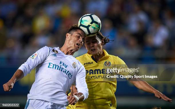 Enes Unal of Villarreal competes for the ball with Cristiano Ronaldo of Real Madrid during the La Liga match between Villarreal and Real Madrid at...
