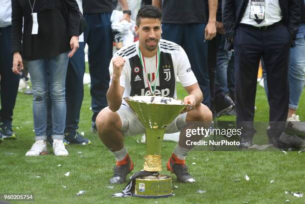 Sami Khedira celebrate with the Scudetto cup after the winning of the Italian championship 2017-2018 at the Allianz stadium on May 19, 2018 in Turin,...