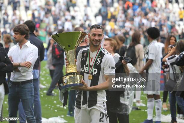 Mattia De Sciglio celebrate with the Scudetto cup after the winning of the Italian championship 2017-2018 at the Allianz stadium on May 19, 2018 in...