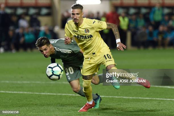 Real Madrid's French goalkeeper Luca Zidane Fernandez tries to block a shot on goal by Villarreal's Spanish midfielder Samuel Castillejo during the...