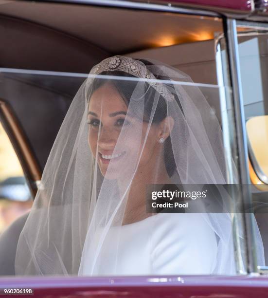 Meghan, Duchess of Sussex arrives for the wedding of Prince Harry to Ms Meghan Markle at St George's Chapel, Windsor Castle on May 19, 2018 in...