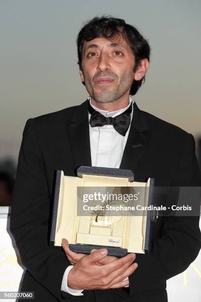 Marcello Fonte poses with the Best Actor award for his role in 'Dogman' the Palme D'Or Winner Photocall during the 71st annual Cannes Film Festival...