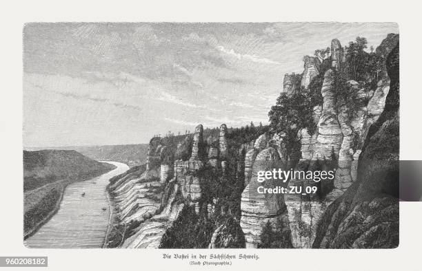 bastei in the saxon switzerland, germany, wood engraving, published 1897 - sandstone stock illustrations