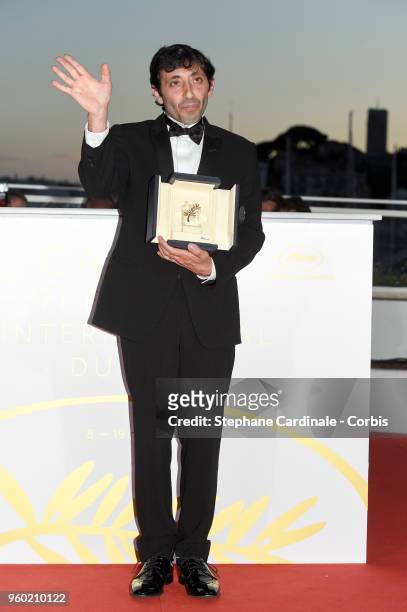 Marcello Fonte poses with the Best Actor award for his role in 'Dogman' the Palme D'Or Winner Photocall during the 71st annual Cannes Film Festival...