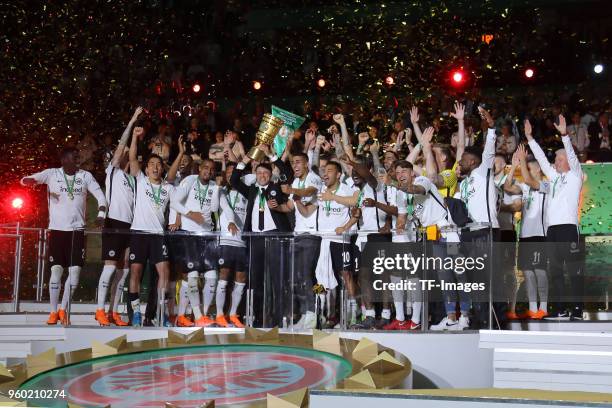 Head coach Niko Kovac of Eintracht Frankfurt celebrates with the trophy after winning the DFB Cup final between Bayern Muenchen and Eintracht...