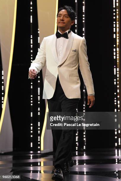 Jury members Chang Chen walks on stage during the Closing Ceremony at the 71st annual Cannes Film Festival at Palais des Festivals on May 19, 2018 in...
