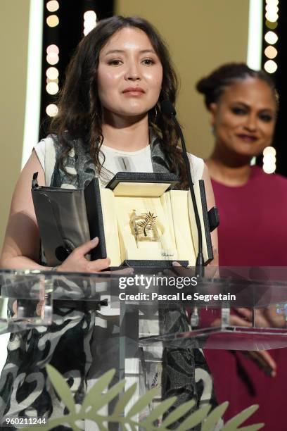 Actress Samal Yeslyamova receives the receives the Best Actress award for 'Ayka' as Jury member Ava DuVernay looks on after presenting on stage...