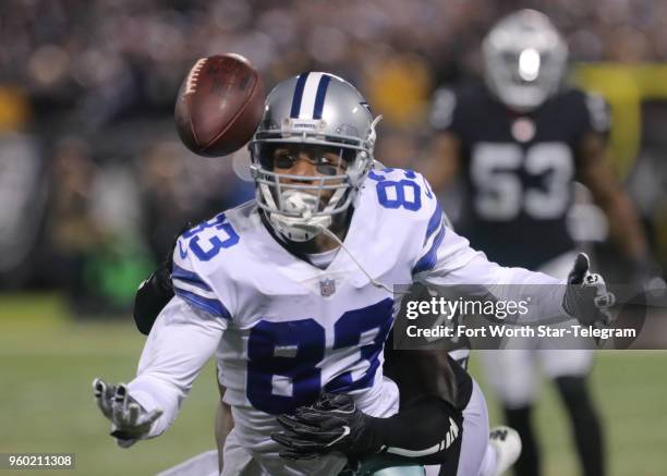 Dallas Cowboys wide receiver Terrance Williams cannot hang on to a pass as Oakland Raiders strong safety Karl Joseph hits him in the third quarter on...