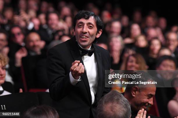 Actor Marcello Fonte gets up to receive the Best Actor award for his role in 'Dogman' during the Closing Ceremony at the 71st annual Cannes Film...