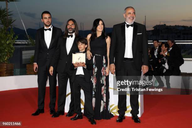 Composer Khaled Mouzanar , actor Zain Alrafeea , director Nadine Labaki and guests pose with the Jury Prize award for 'Capharnaum' at the Palme D'Or...