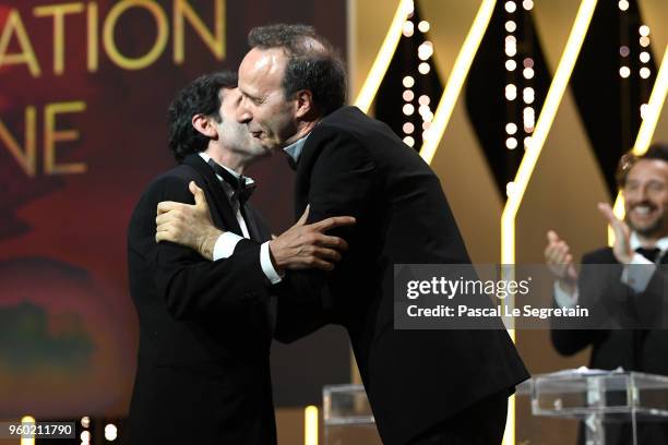 Roberto Begnini greet with Marcello Fonte as he receives the Best Actor award for his role in 'Dogman' during the closing ceremony of the 71st annual...