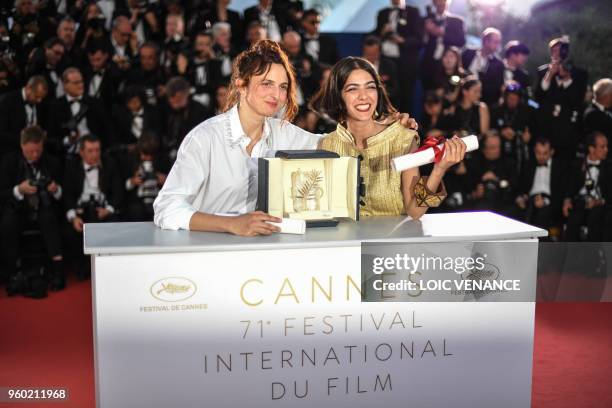 Iranian actress and daughter of Jafar Panahi Solmaz Panahi , who represents her father Jafar Panahi, and Italian director Alice Rohrwacher pose with...