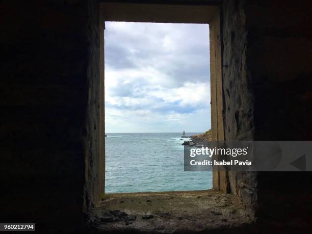 scenic view of sea against sky from window - isabel pavia stock-fotos und bilder