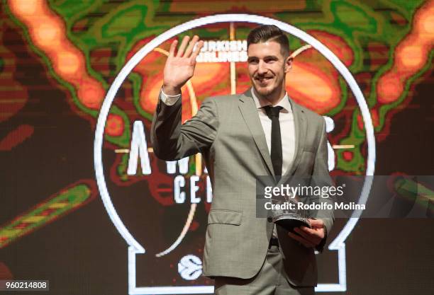 Nando de Colo, #1 of CSKA Moscow poses with First Team Award during the 2017-18 Turkish Airlines EuroLeague Awards Ceremony at Palace of Serbia on...