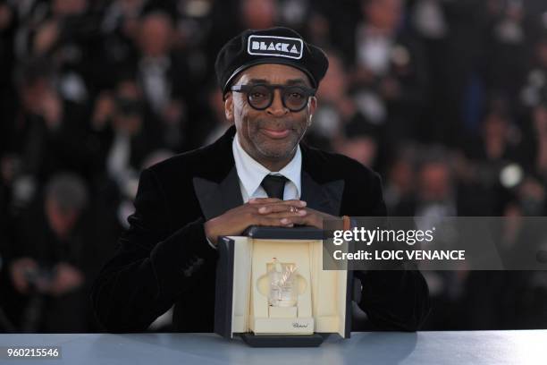 Director Spike Lee poses with his trophy on May 19, 2018 during a photocall after he won the Grand Prix for the film "BlacKkKlansman" at the 71st...