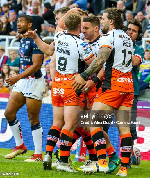 Castleford Tigers' Jv Hitchcox celebrates with teammates after scoring his side's first try during the Betfred Super League Round 15 match between...