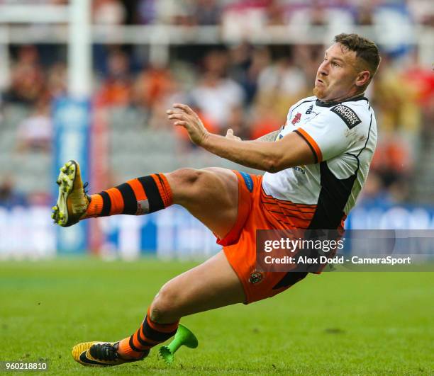 Castleford Tigers' Jamie Ellis slips while kicking a conversion during the Betfred Super League Round 15 match between Castleford Tigers and Leeds...