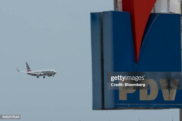 An American Airlines Group Inc. Plane prepares to land at Simon Bolivar International Airport in Maiquetia, Vargas state, Venezuela, on Tuesday, May...