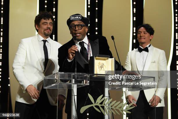 Benicio Del Toro and Jury member Chang Chen are seen on stage while Director Spike Lee receives the Grand Prix award for 'BlacKkKlansman' during the...