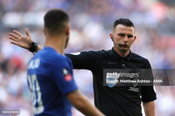 Referee Michael Oliver gestures during the Emirates FA Cup Final between Chelsea and Manchester United at Wembley Stadium on May 19, 2018 in London,...