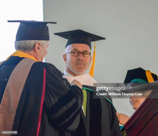 And SiriusXM talk show host Michael Smerconish receives an Honorary Doctor of Letters during commencement exercises at Delaware Valley University on...