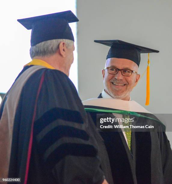And SiriusXM talk show host Michael Smerconish receives an Honorary Doctor of Letters during commencement exercises at Delaware Valley University on...