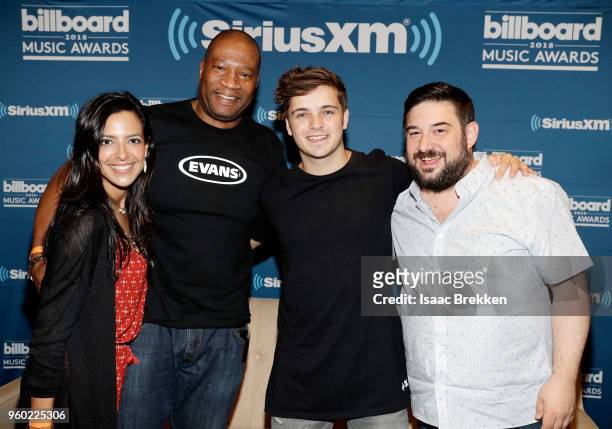 Stanley T, Nicole Ryan, Martin Garrix and Ryan Sampson attend The Morning Mash Up on SiriusXM Hits 1 backstage broadcast leading up to the Billboard...