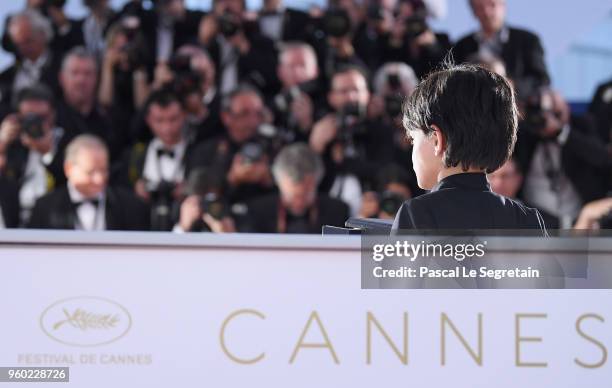 Actor Zain Alrafeea poses with Director Nadine Labaki's Jury Prize award for 'Capharnaum' at the photocall the Palme D'Or Winner during the 71st...